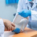 Orthopedic fracture specialist in Pune examining a patient’s injured arm